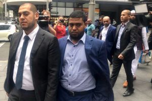 Uber driver Nazrul Islam (right) has avoided jail after one of his passengers fell in front of a bus and died.